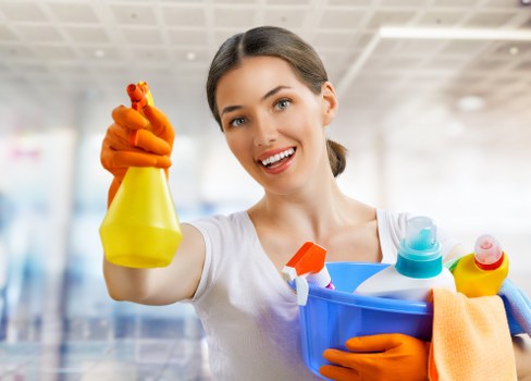 Office cleaning team sanitising shared surfaces in SW9