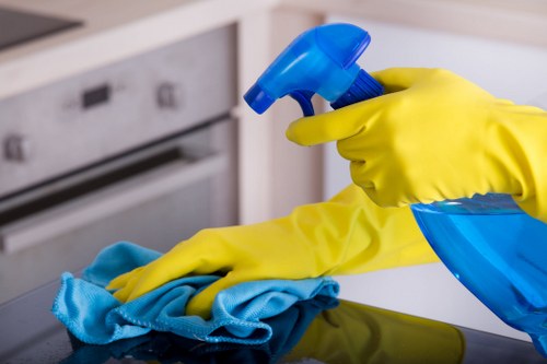Professional carpets cleaner in SW9 deep cleaning a living room carpet