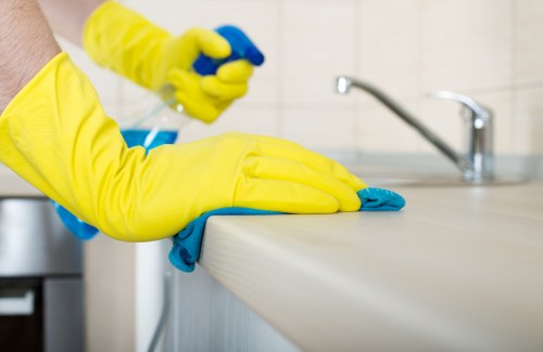 Trained carpet cleaner using protective gear during a SW9 job