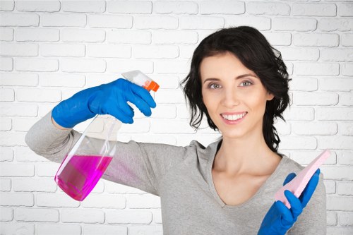 Domestic cleaning service in SW9 with kitchen surfaces being wiped clean